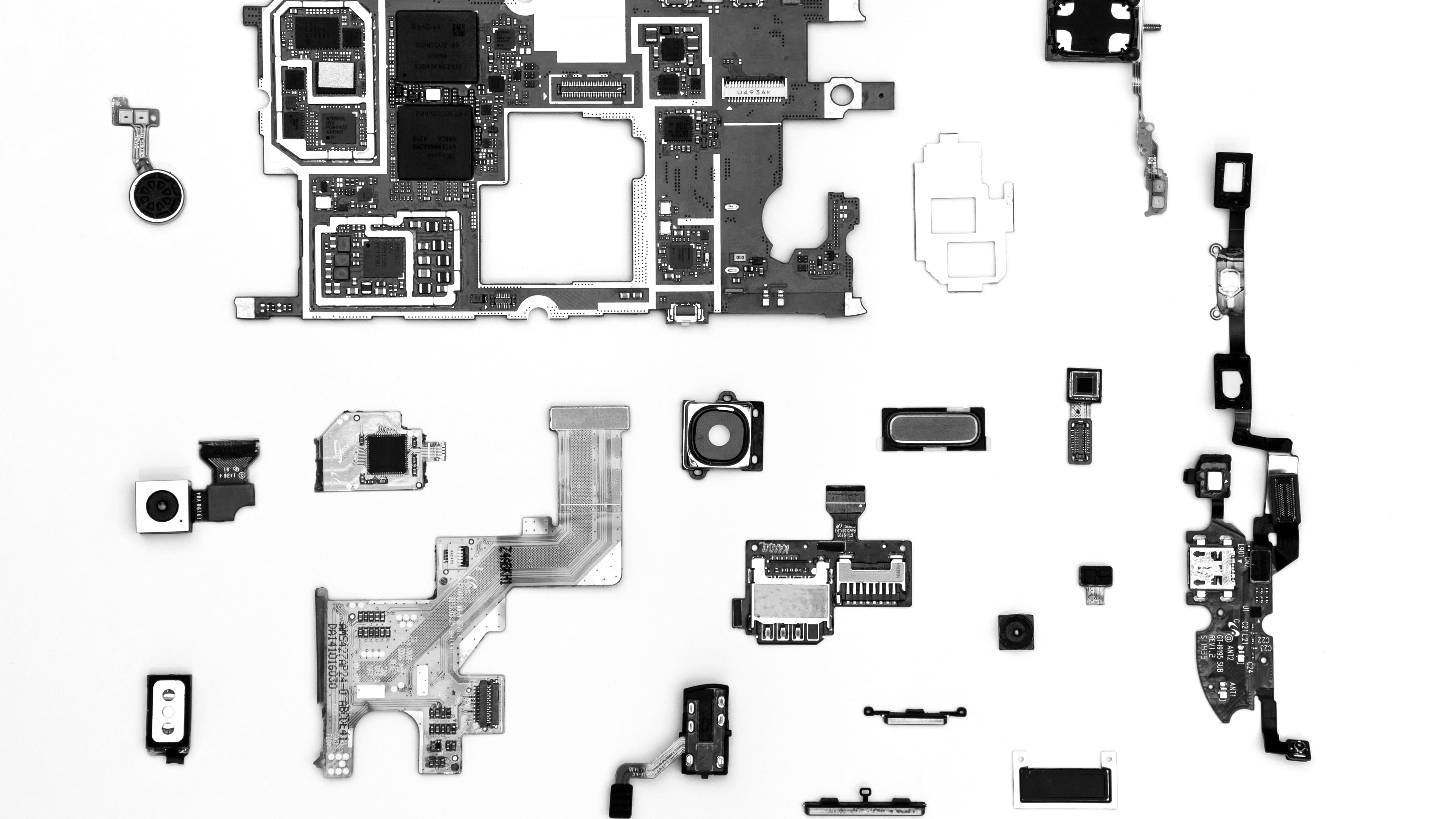 Monochrome exploded view of the components inside a mobile device